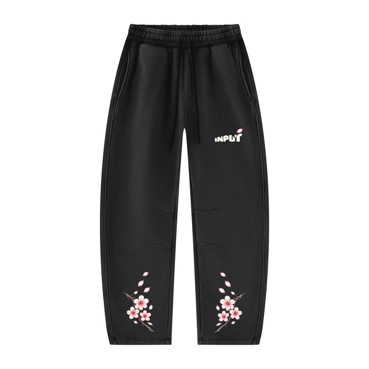 Front of the black INPUT Cherry Blossom Barrel sweatpants with pink blossom artwork